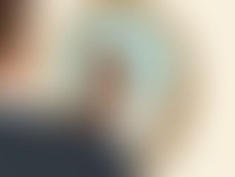 A man looking in a mirror, seeing Jesus looking back at him.