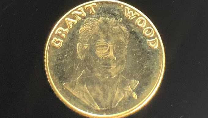 0.18g 24K Gold medallion