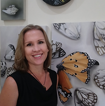 Mia photo with artworks.png