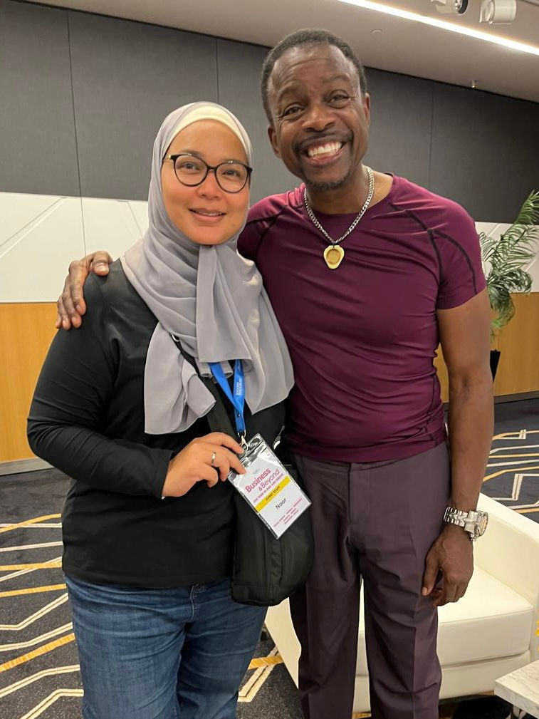 Noor Kassim with leadership coach Joseph McClendon III, reflecting her engagement with world-class personal development and b