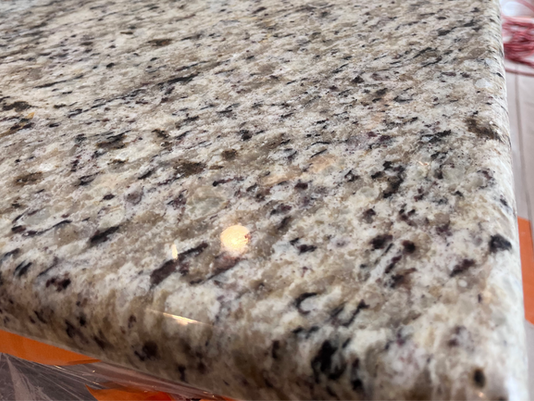 The Mystery of the "Dull Spot": Why Your Kitchen Island is Losing Its Shine (and How to Fix It)