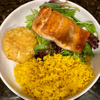 crabcake and salmon Valentine's Day dinner on a plate
