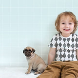 Boy with Pug Puppy
