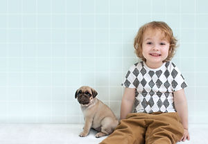 Boy with Pug Puppy