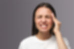 young lady with bruxism pain related headache