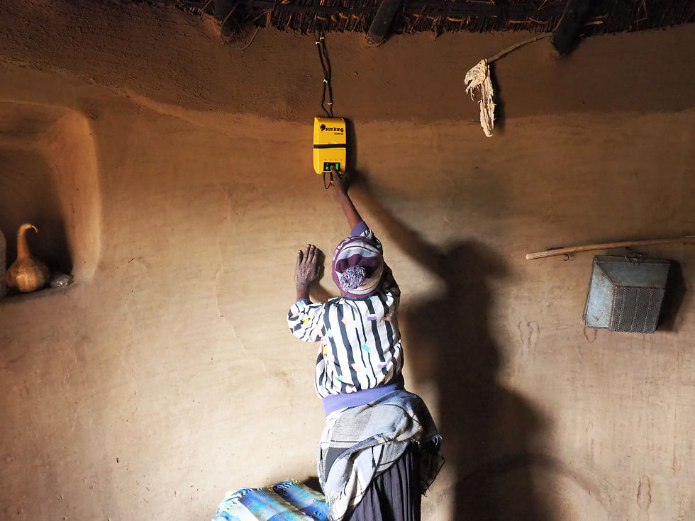 Benefeciary using the solar home system