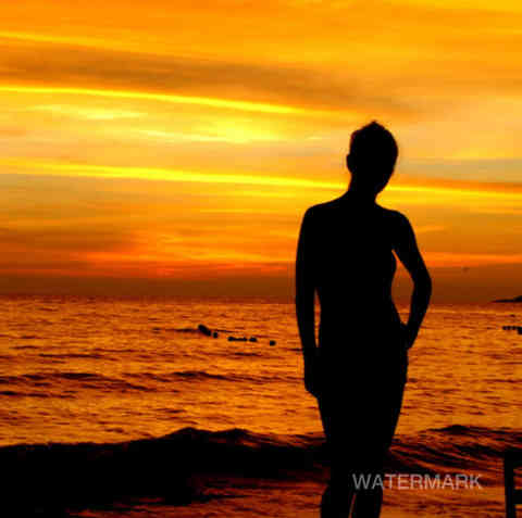 Brittany walking the beaches of Thailand as the sun sets in Kho Samet