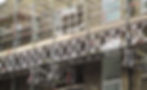 A suspended servicing scaffolding