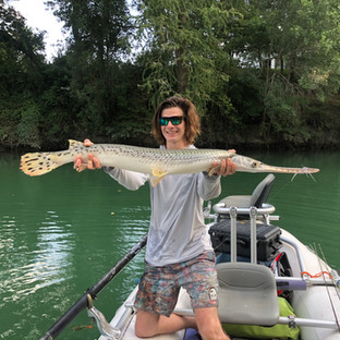 Cody LaCroix with a Longnose Gar on the Fly in Jurassic Park
