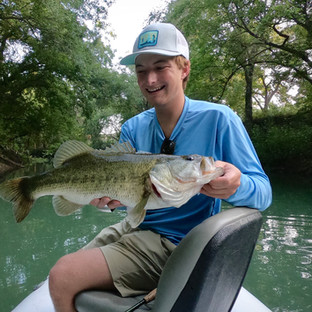 Damien with a nice Jurassic Park Largemouth on the Fly