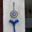 Miniatyrbilde: Evil Eye with Bells