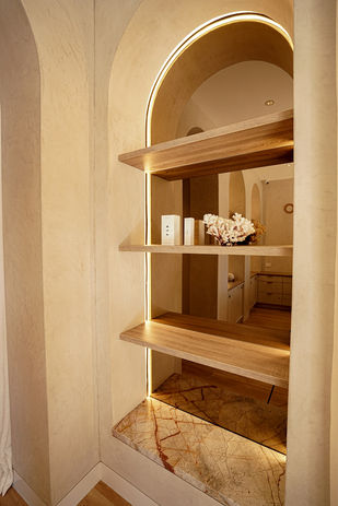 white microcement feature by raw surfaces