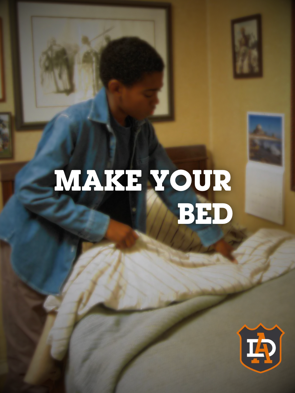 Kid making bed