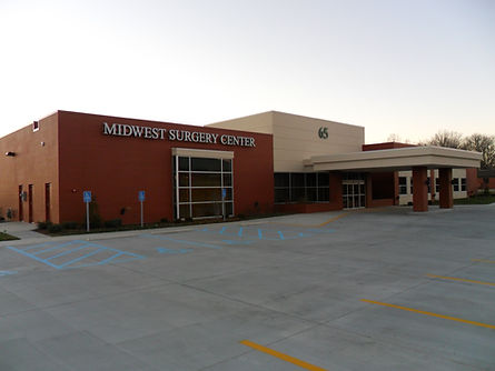 Midwest Surgery Center with a sunset