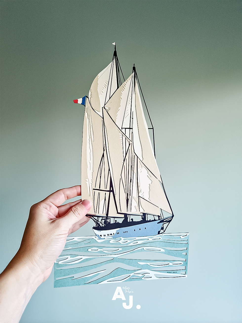 Voilier en papier découpé - kirigami. ©Audrey Jouve
