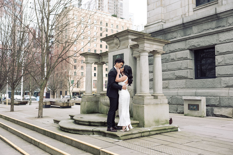 a couple posing at an engagement photoshoot in Vancouver