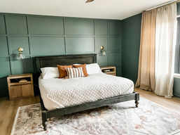 Traditional King Bed. Wainscotting. Spindled Legs. Streamlined Nightstands. Wall-mounted Light Sconces.