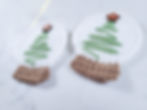 Two side by side Christmas Tree Snow Globe coasters