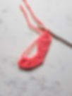 The heart applique stitches placed into the magic circle for the Crochet Heart Envelope Gift Card Holder.