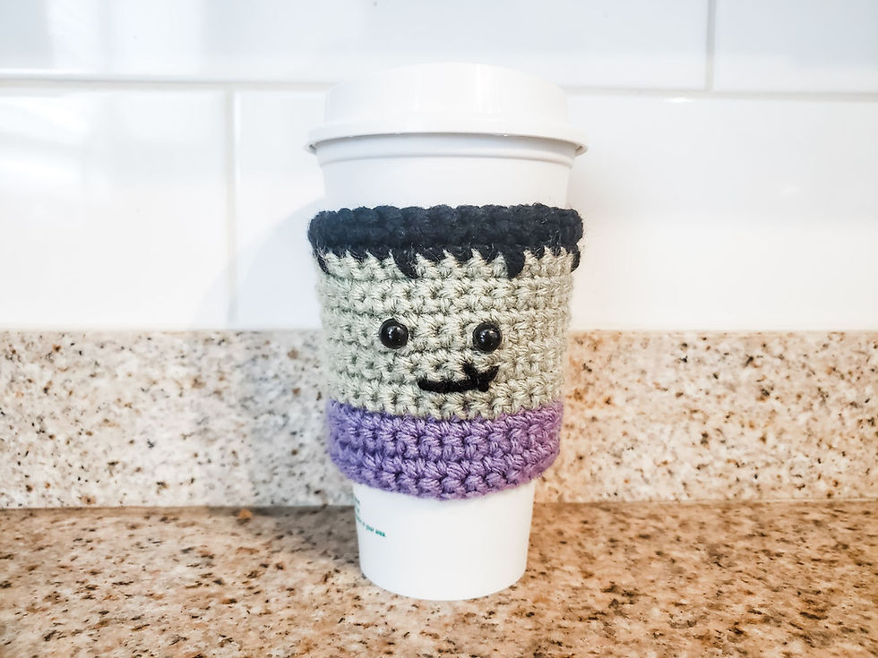 Crochet Frankenstein Coffee Cozy on a reusable Starbucks mug