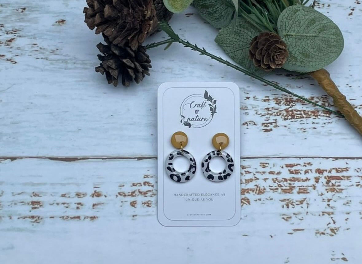 Black and white stud hoops
