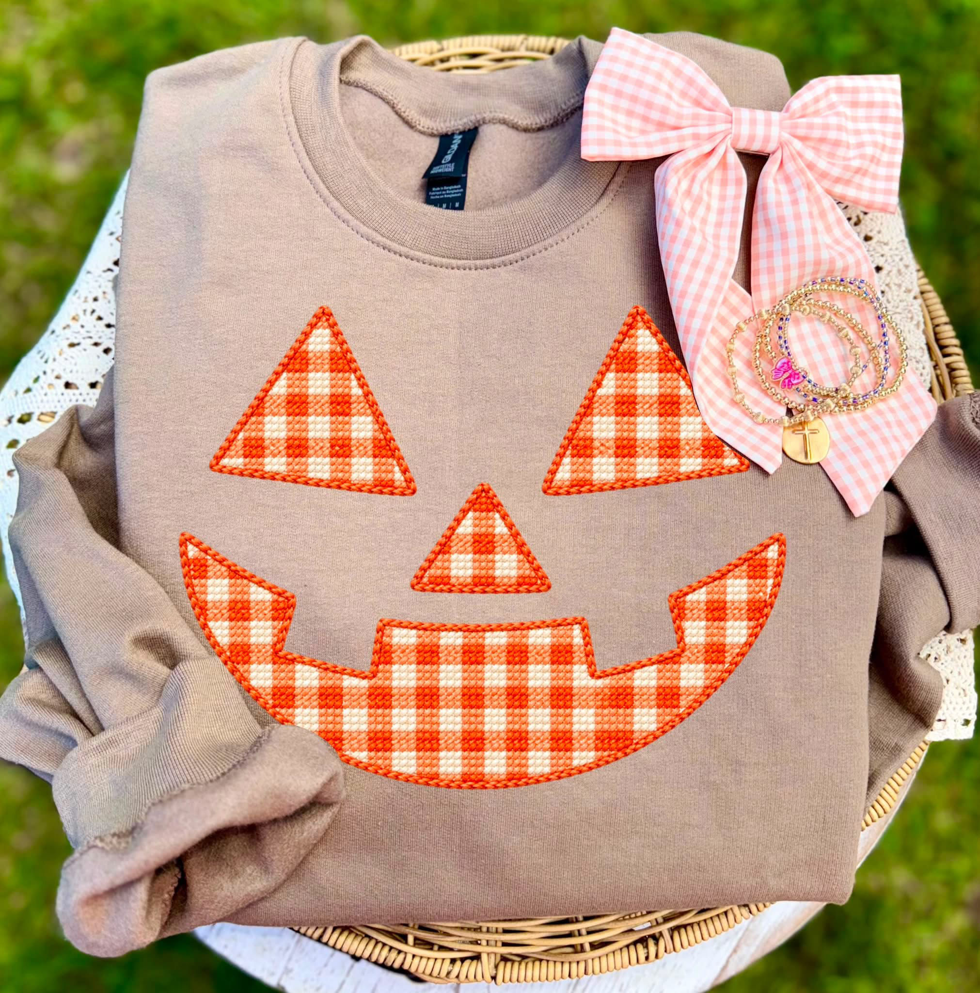Pumpkin face cross stitch plaid
