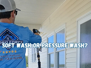 Soft Washing Being Preformed By A Technician At A Beach House In Emerald Isle, NC