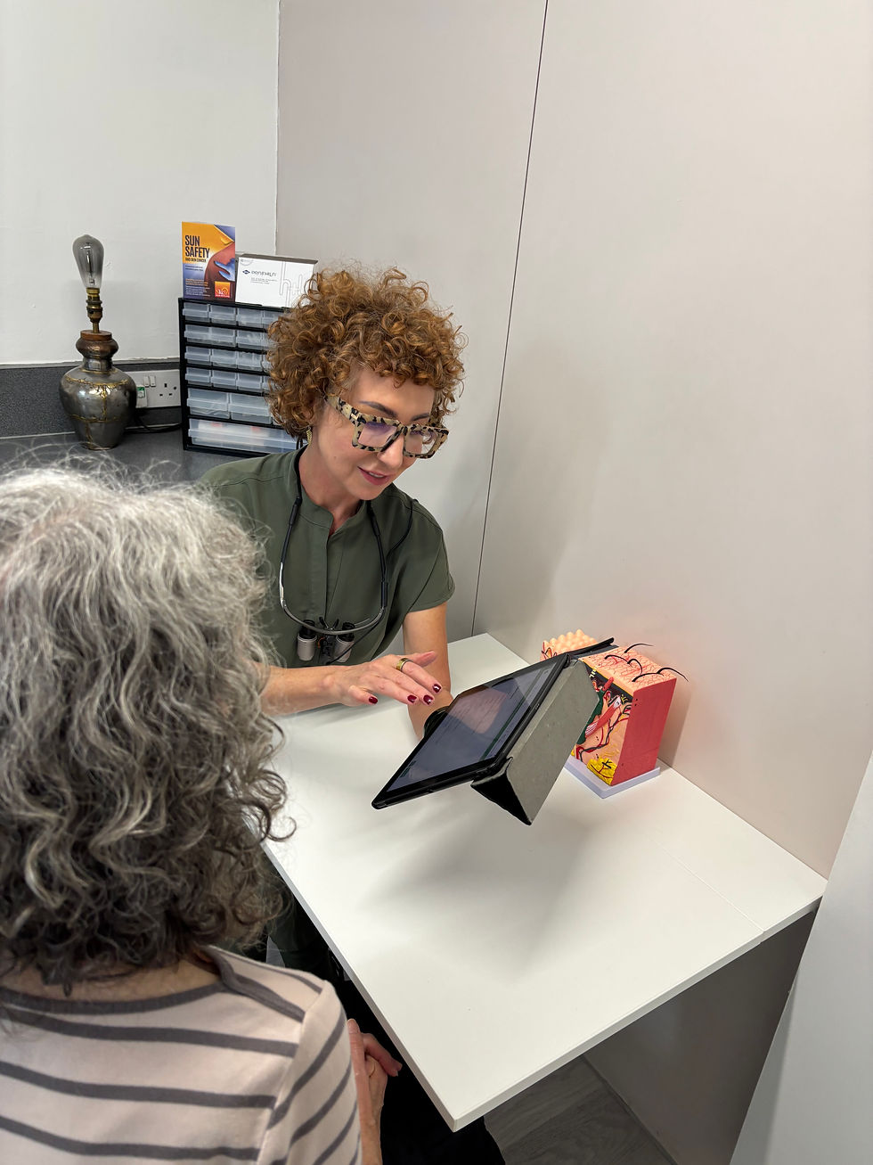 Meet the team - Sharon with customer.jpeg