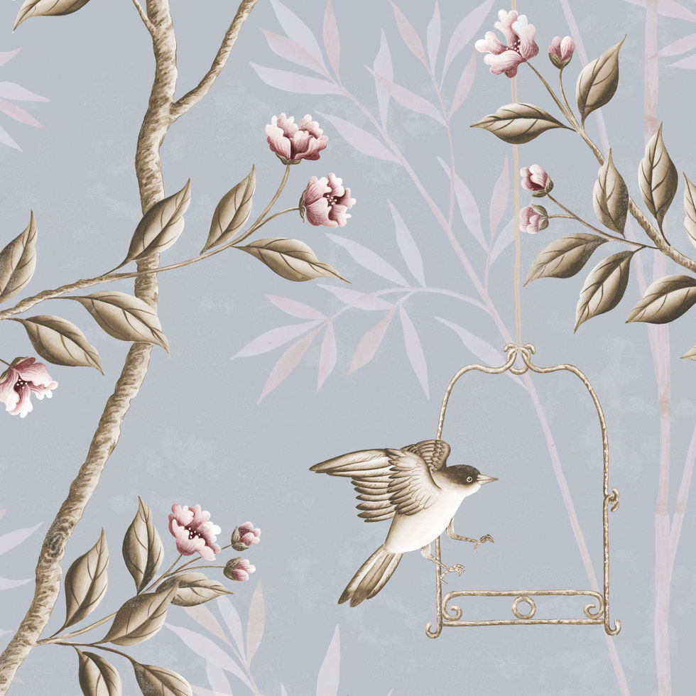 Chinoiserie Wallpaper Pauline is a layered and textured wallpaper with birds an trailing sepia branches and pink flowers on a muted blue-sand