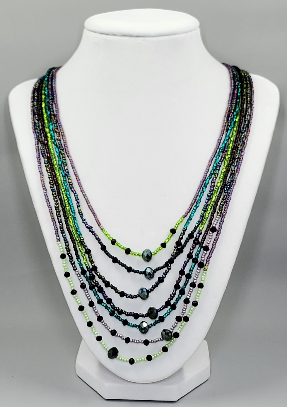 Thumbnail: 7 Strand Seed Bead Necklace with faceted accent beads
