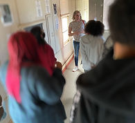 Museum Maven team member speaking to a group of people. Click on this image to go to the Field Trip Programs section of the Services page.