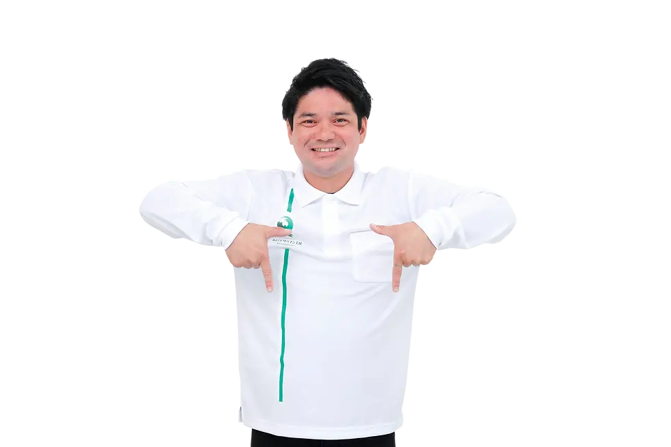 Digital cutout of a smiling man in a white polo shirt pointing downwards with both index fingers. He appears friendly and ready to guide or instruct.