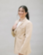 Woman in a beige blazer
