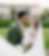 Smiling bride and groom embrace at a grand wedding venue