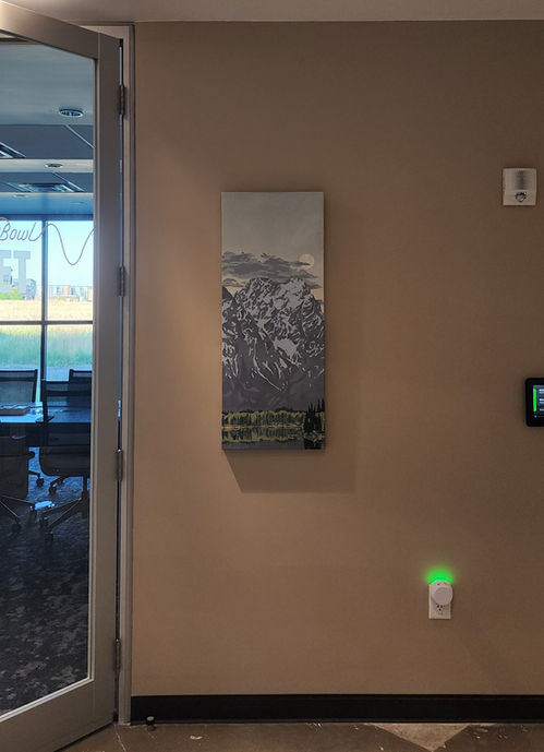 Moonlit Tetons by Artist Jack Schnepf Featured in Engine works a building in Montana State University's Innovation Campus, located in Bozeman Montana