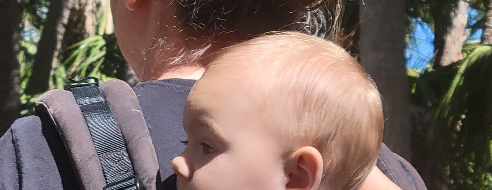 Sis. Lydia with Hiley Ann on her back.