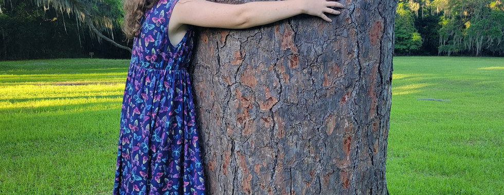 Ruth hugging a tree