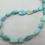 Thumbnail: Turquoise Nugget Teardrop Strand Sleeping Beauty 7x5-10x8mm 15 Inch Strand