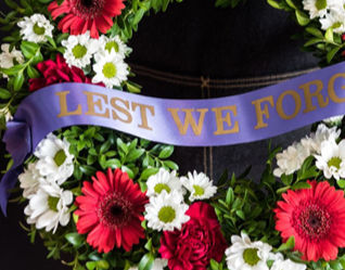 Red and white flower wreath remembrance anzac day