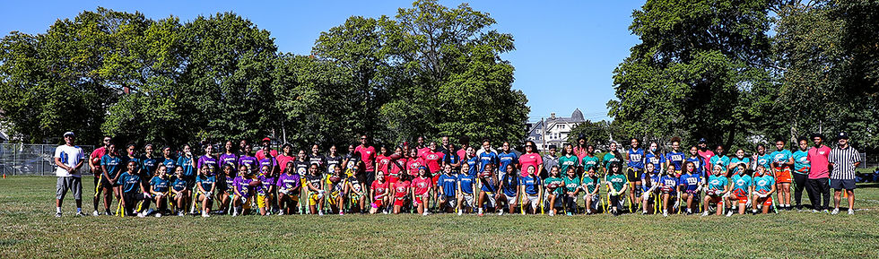 Above: Players, coaches, and league officials ready for the start of the new Yonkers Girls NFL Flag Football League