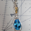Thumbnail: Blue topaz with citrine wrapped in sterling silver 