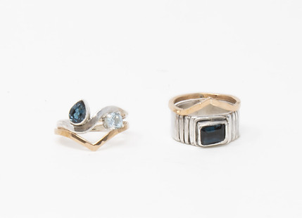 Two engagment and wedding band sets with sterling silver, bronze, and blue topaz