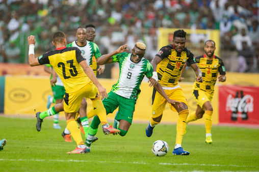 Victor Osimhen surrounded by a wall of yellow and black