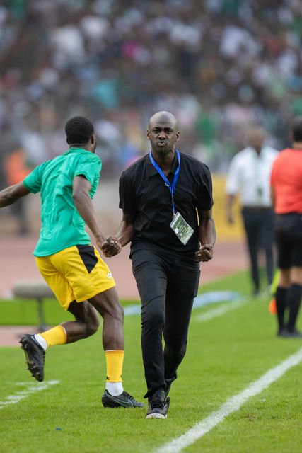 Otto Addo celebrates Ghana's opener that stunned Abuja to silence