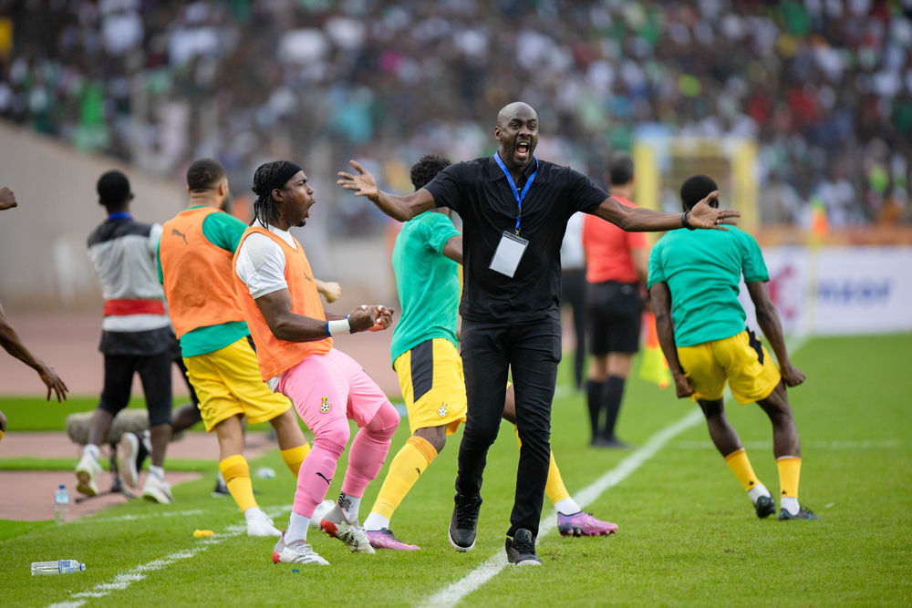 Otto Addo celebrates Ghana's opener that stunned Abuja to silence
