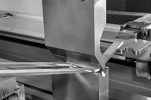 operator bending metal sheet by sheet bending machine.jpg