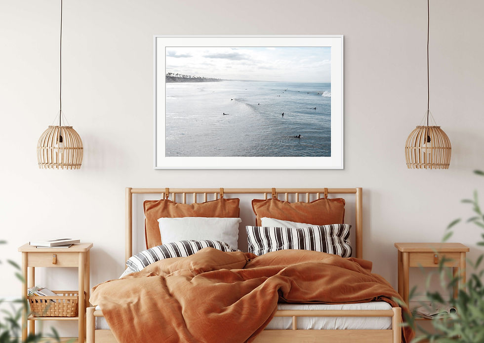Thumbnail: A framed photograph of surfers in the morning light off the coast of Oceanside, California.