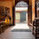 Thumbnail: A color photograph of a motorcycle seen through the open doors of a charming cafe in San Vicente, El Salvador