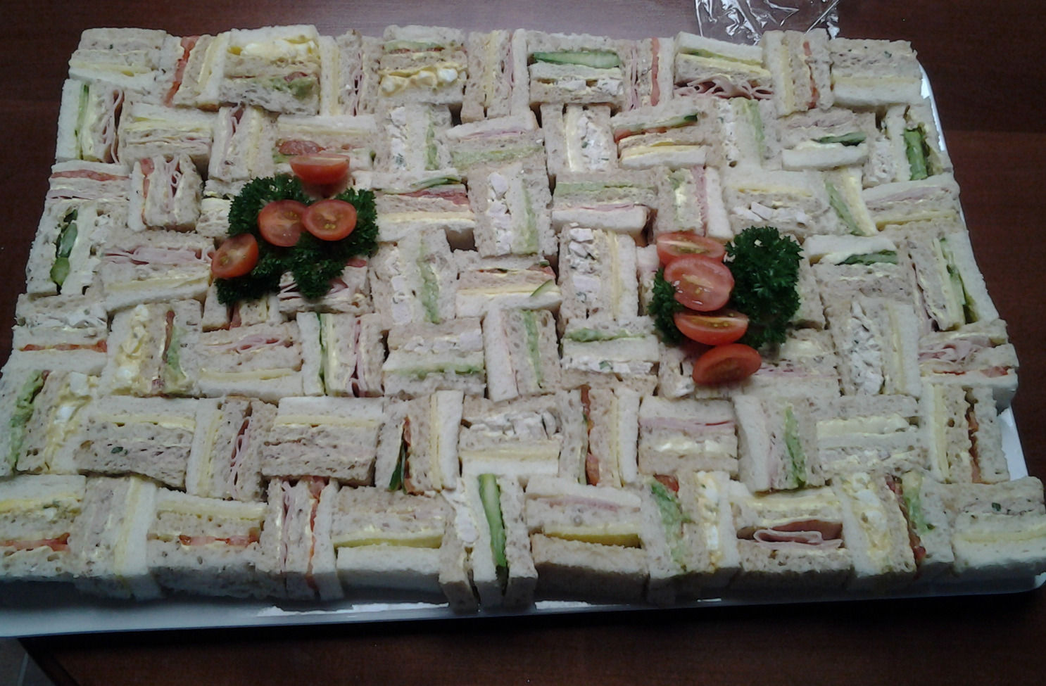 Assorted gourmet club sandwiches.