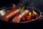 Our signature hotlinks being prepared in a pan.